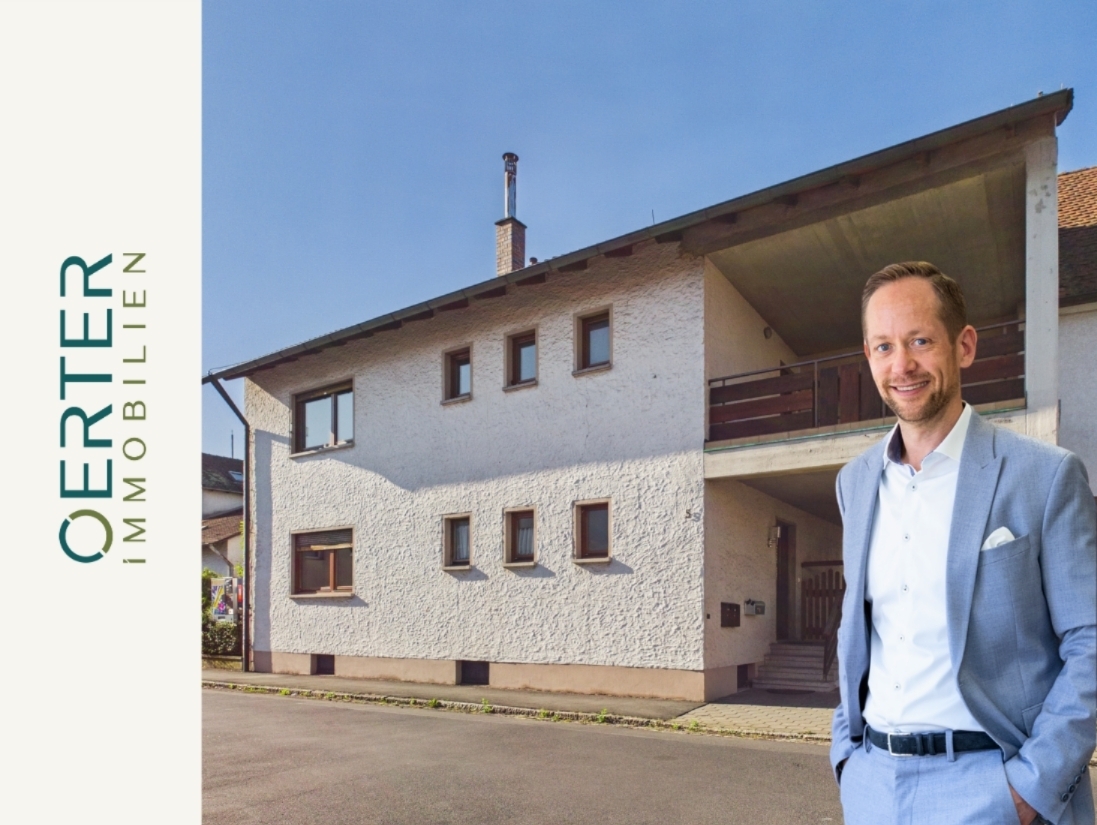 Sanierungsbedürftiges Zweifamilienhaus mit Garten, Balkon & Garagen