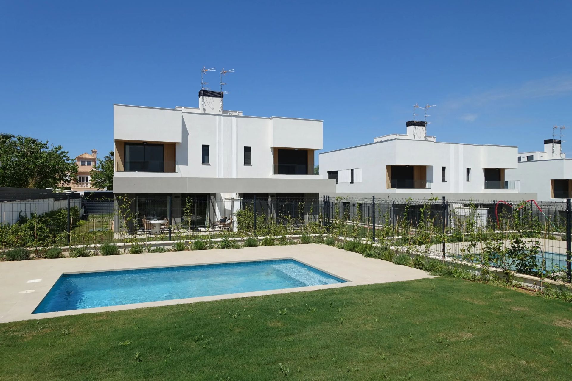 Ready-to-move-in new-build semi-detached house with partial sea view in Puig de Ros, Mallorca