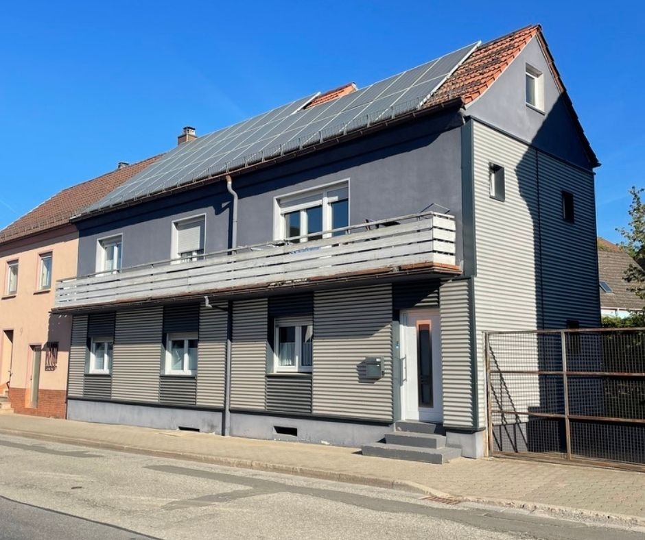 Vermietetes Haus + Baugrundstück: 2 Chancen in einem Kauf – 1/19