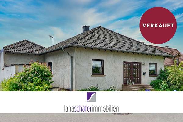 Bekond: Freistehendes Wohnhaus mit Garage und großzügigem Garten
