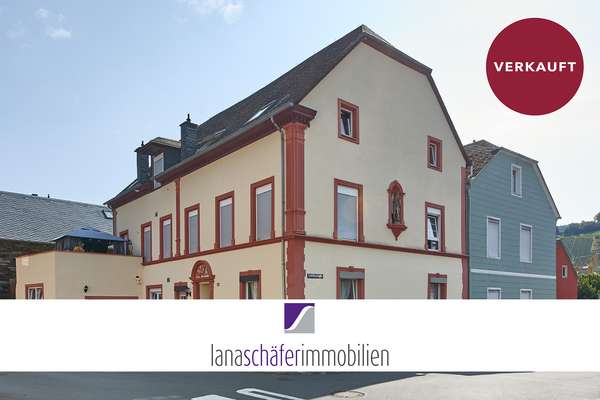 Bernkastel-Kues: Mehrfamilienhaus mit 7 PKW-Stellplätzen