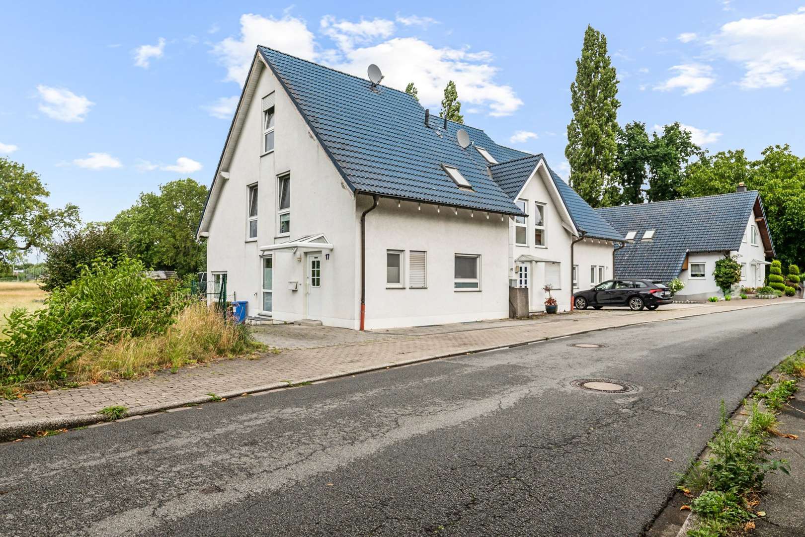 Reihenmittelhaus mit ca. 133 m² Wohnfläche, drei Ebenen, Keller und ausgebautem Spitzboden in Holzwickede – Ansicht 2
