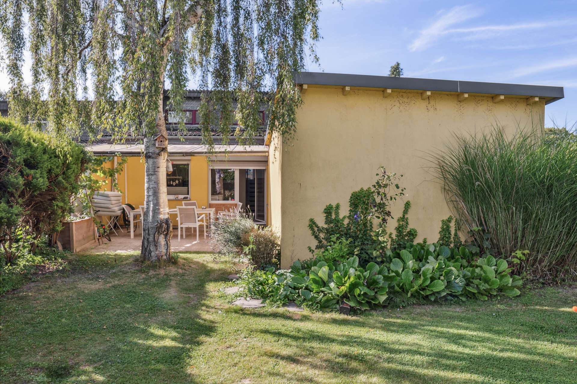 Charmantes Reihenendhaus in Split-Level-Bauweise mit großem Garten für die ganze Familie in Bochum – Ansicht 2