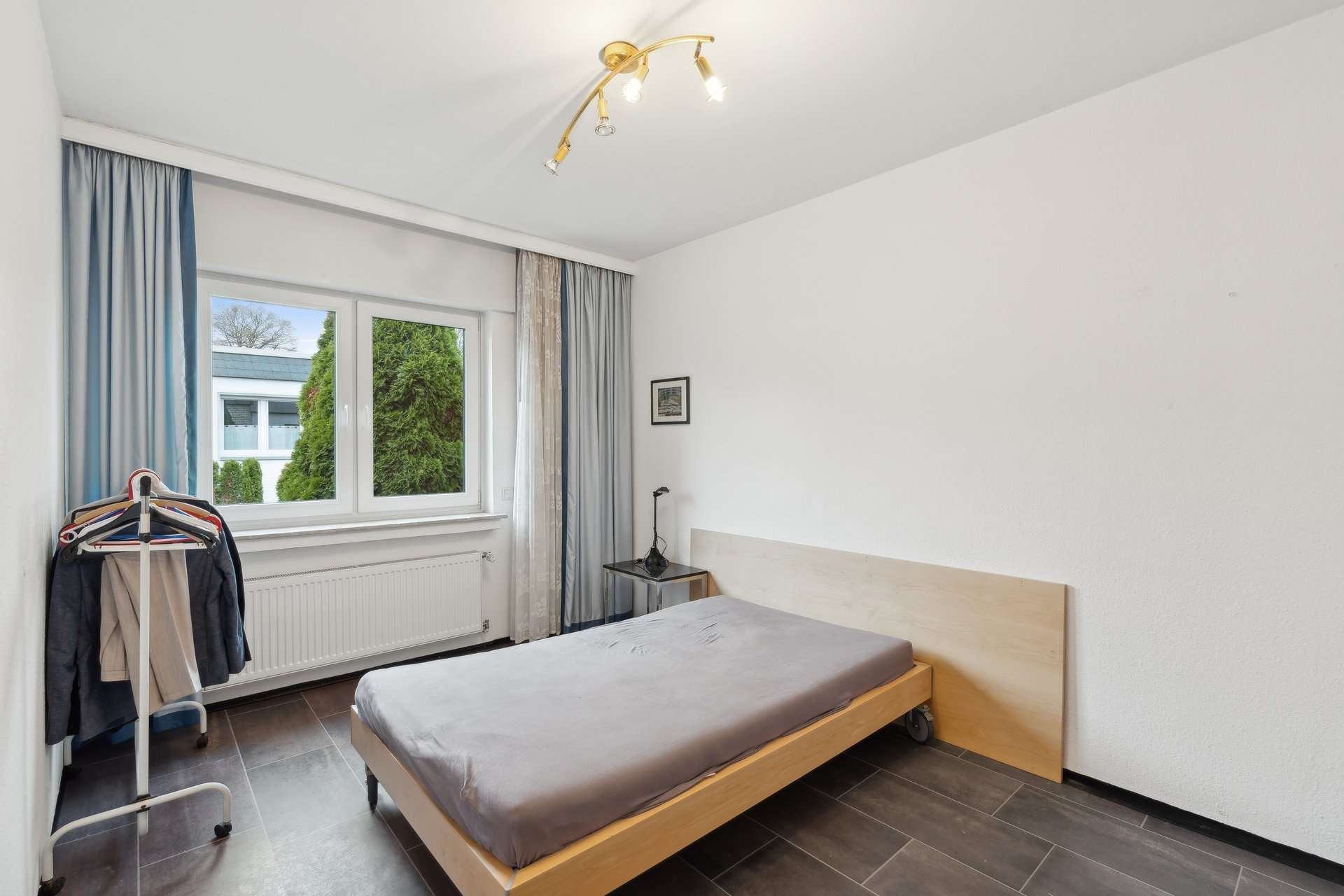 Stilvoller Bungalow mit ausgebautem Wohnkeller, Fernwärme und durchdachtem Grundriss in Herten – Ansicht 11