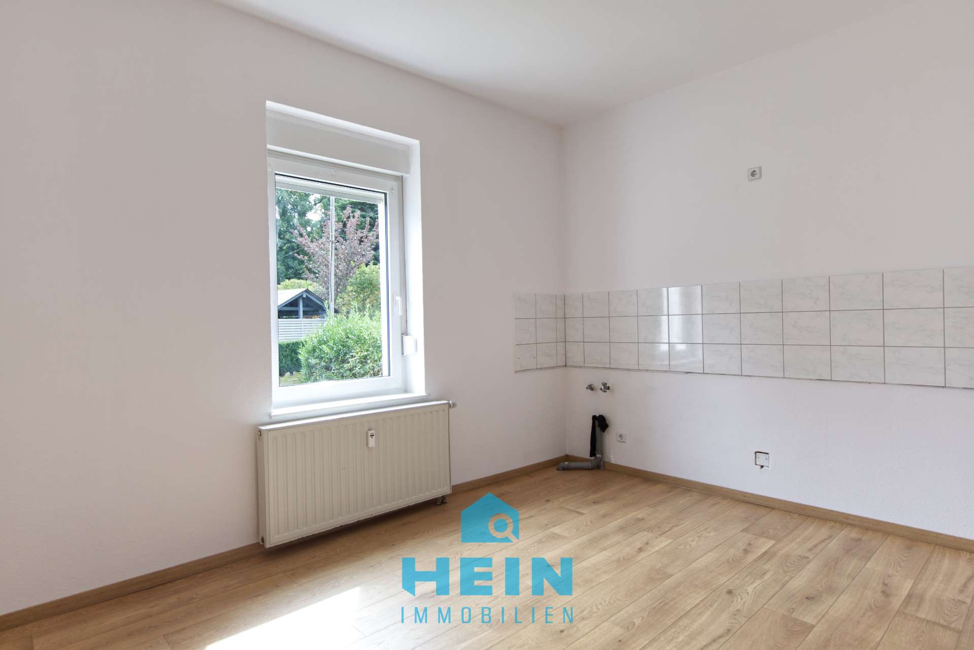 Freundliche 2-Raumwohnung mit Pkw-Stellplatz und eigenen Gartenanteil