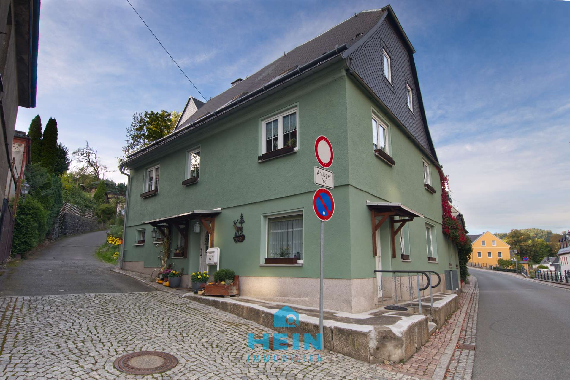 Charmantes und gepflegtes Ein- bis Zweifamilienhaus im Herzen von Lößnitz