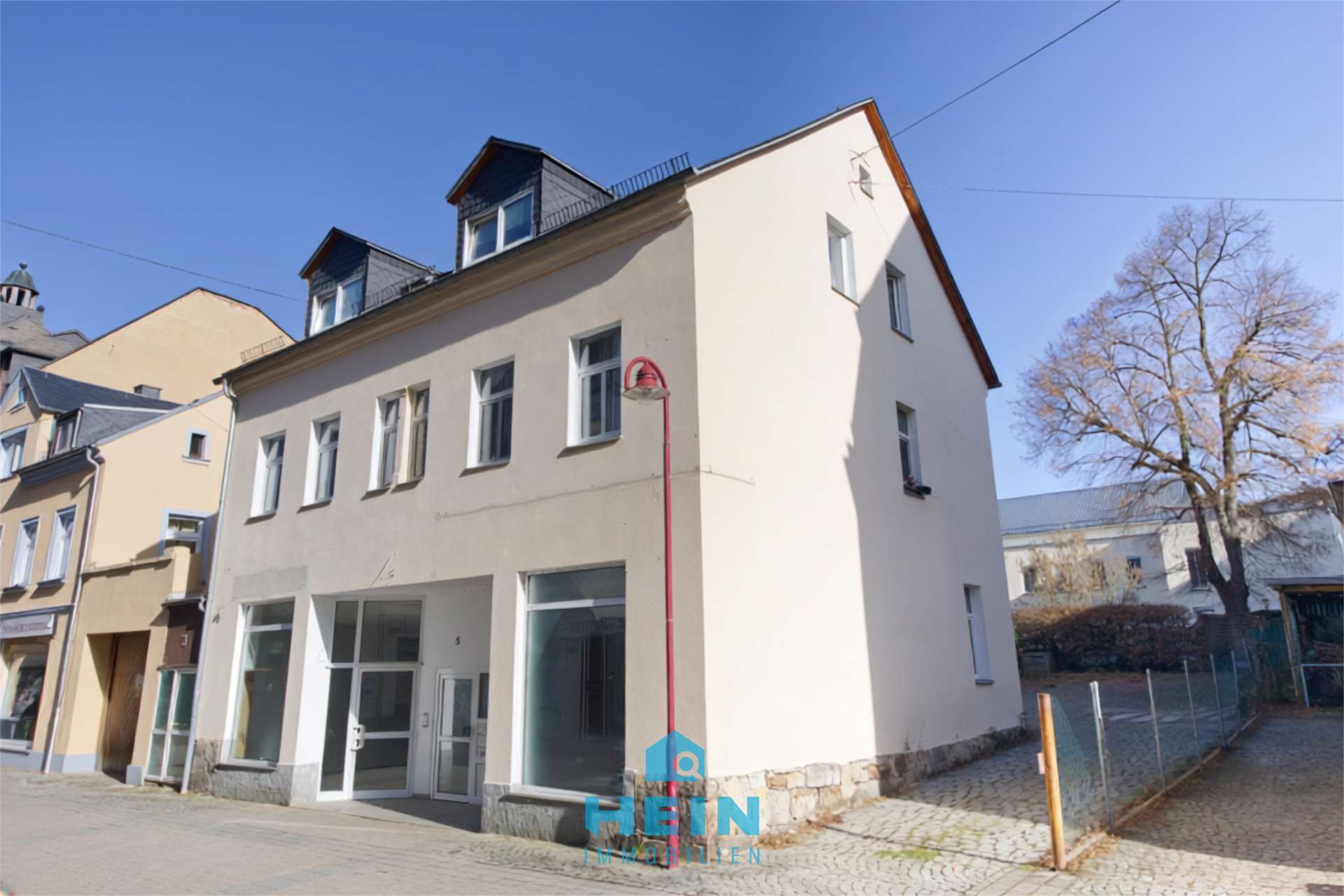 Solide Basis, starke Perspektive – Wohn- und Geschäftshaus mit 11,58% Bruttorendite auf de Sollmiete