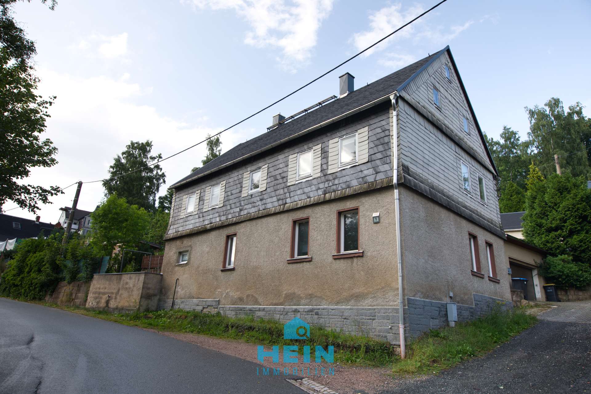 Vielfältig nutzbares Einfamilienhaus mit Ausbaureserve, Garage und Garten in Stützengrün!