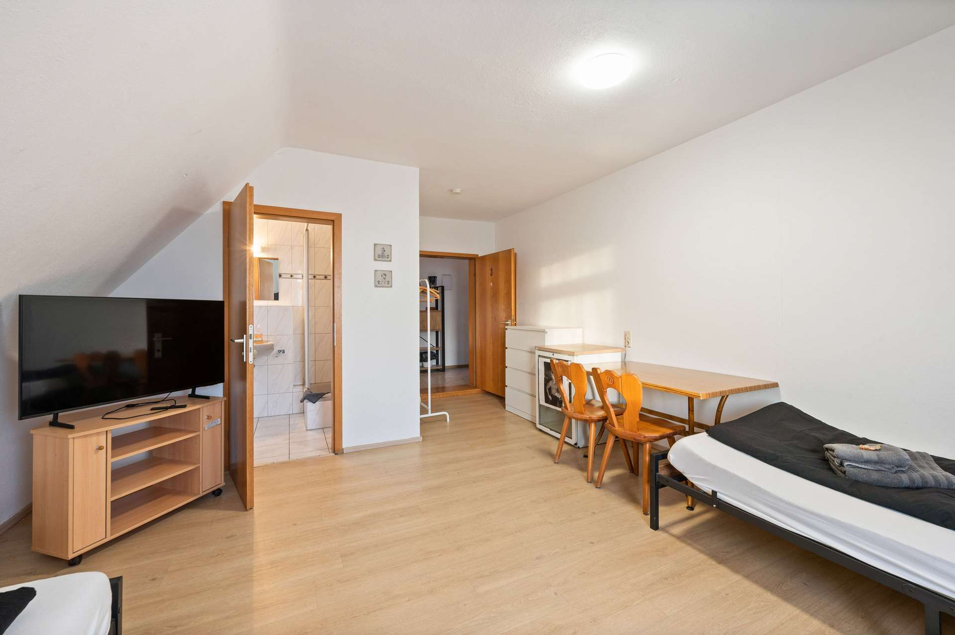 08 Fremdenzimmer