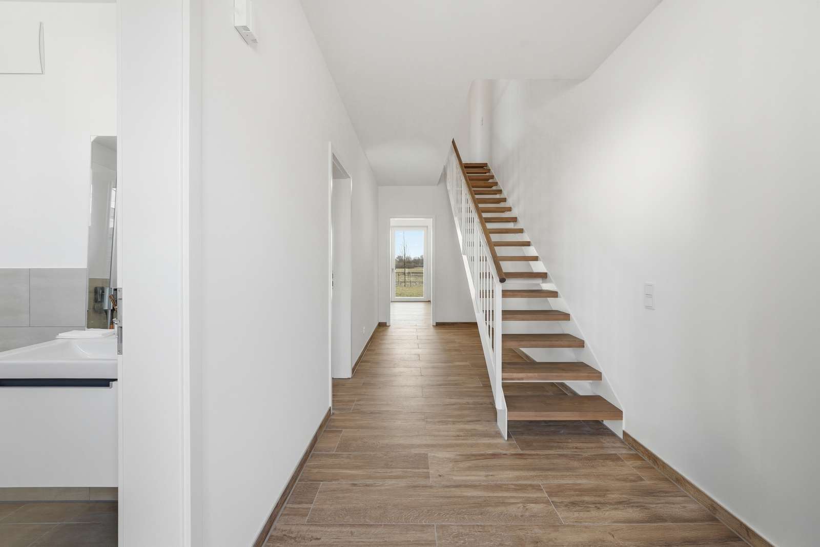 Stairs to the upper floor (sample image, identically built property)