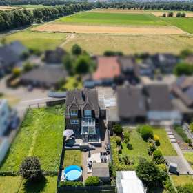 Immobilie kaufen - WOHNBAU: Ihr traumhaftes Einfamilienhaus mit ca. 220 m² wartet !