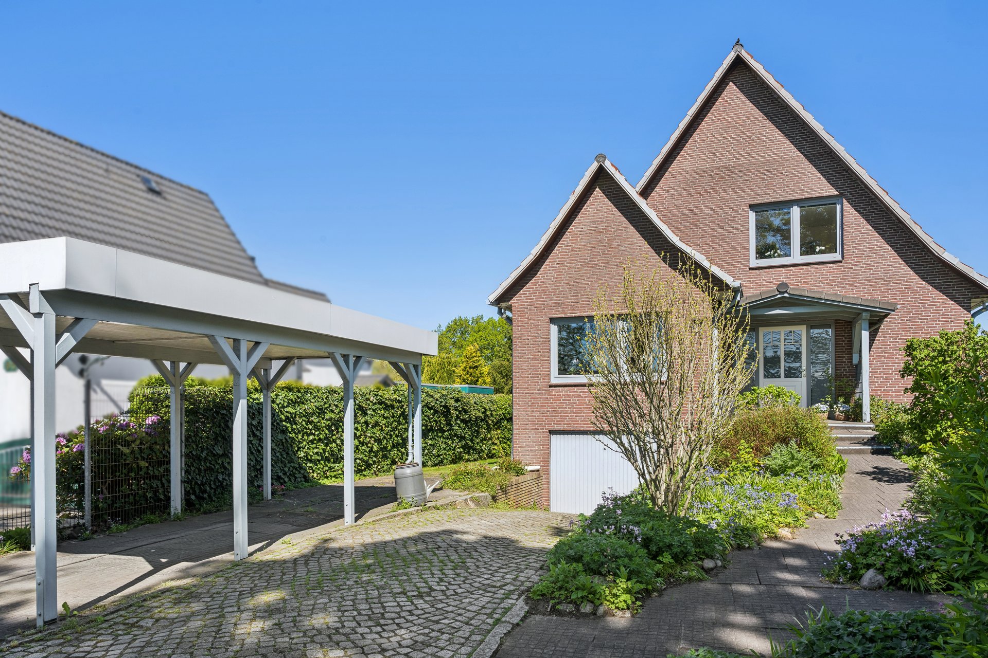 Ein Ort zum Wohlfühlen – Familienhaus mit viel Platz und schöner Gartenanlage