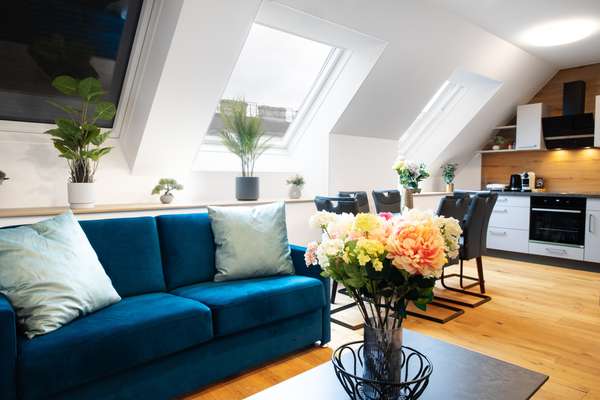 Wohnzimmer mit Küche