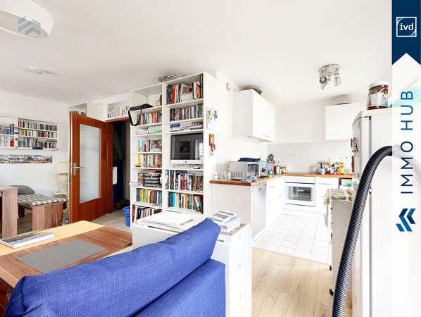 Wohnzimmer mit offener Küche – Bild 7