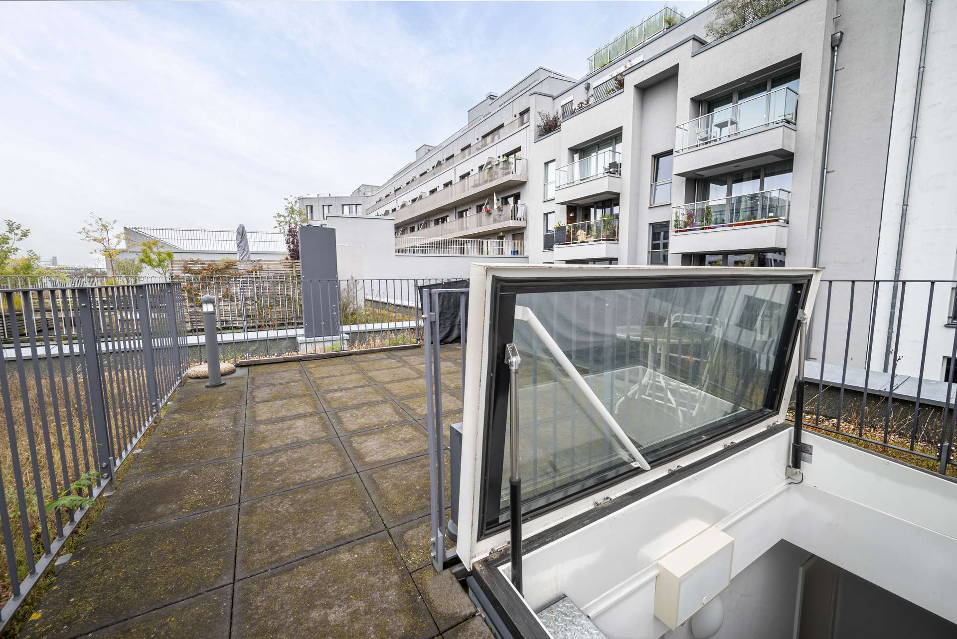 Treppenaufgang zur privaten Dachterrasse