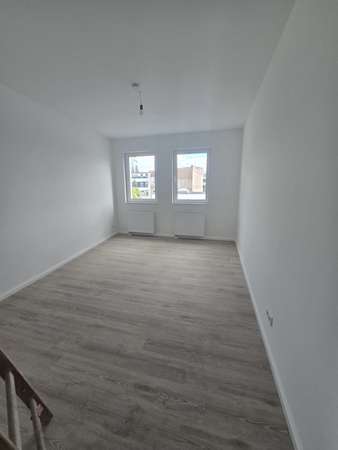 Erstbezug nach Ausbau – Moderne 3-Zimmer-Wohnung mit Balkon, Foto 3