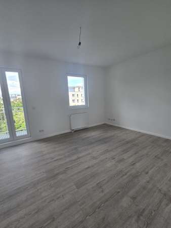 Erstbezug nach Ausbau – Moderne 3-Zimmer-Wohnung mit Balkon, Foto 2