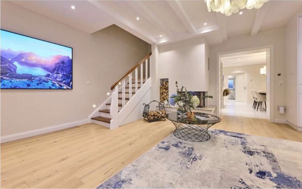 Modernes Zuhause mit offenem Kamin in Grünwald - Bild 5