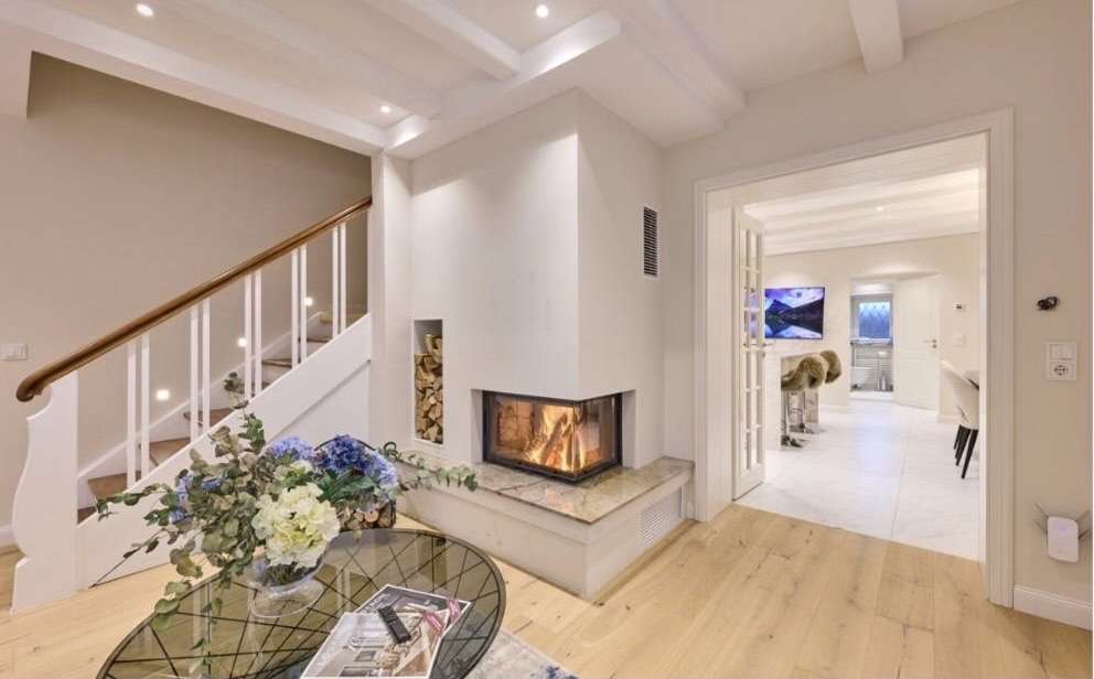 Modernes Zuhause mit offenem Kamin in Grünwald - Bild 4