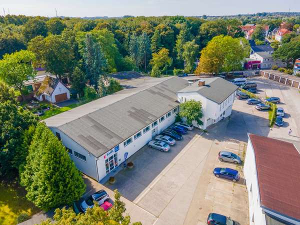 Gewerbeeinheit mit Verkaufsfläche, Lager und Büro