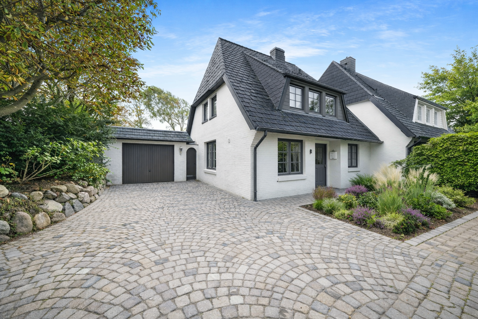 Charmante Doppelhaushälfte mit Garage und Südgarten in Alt-Westerland