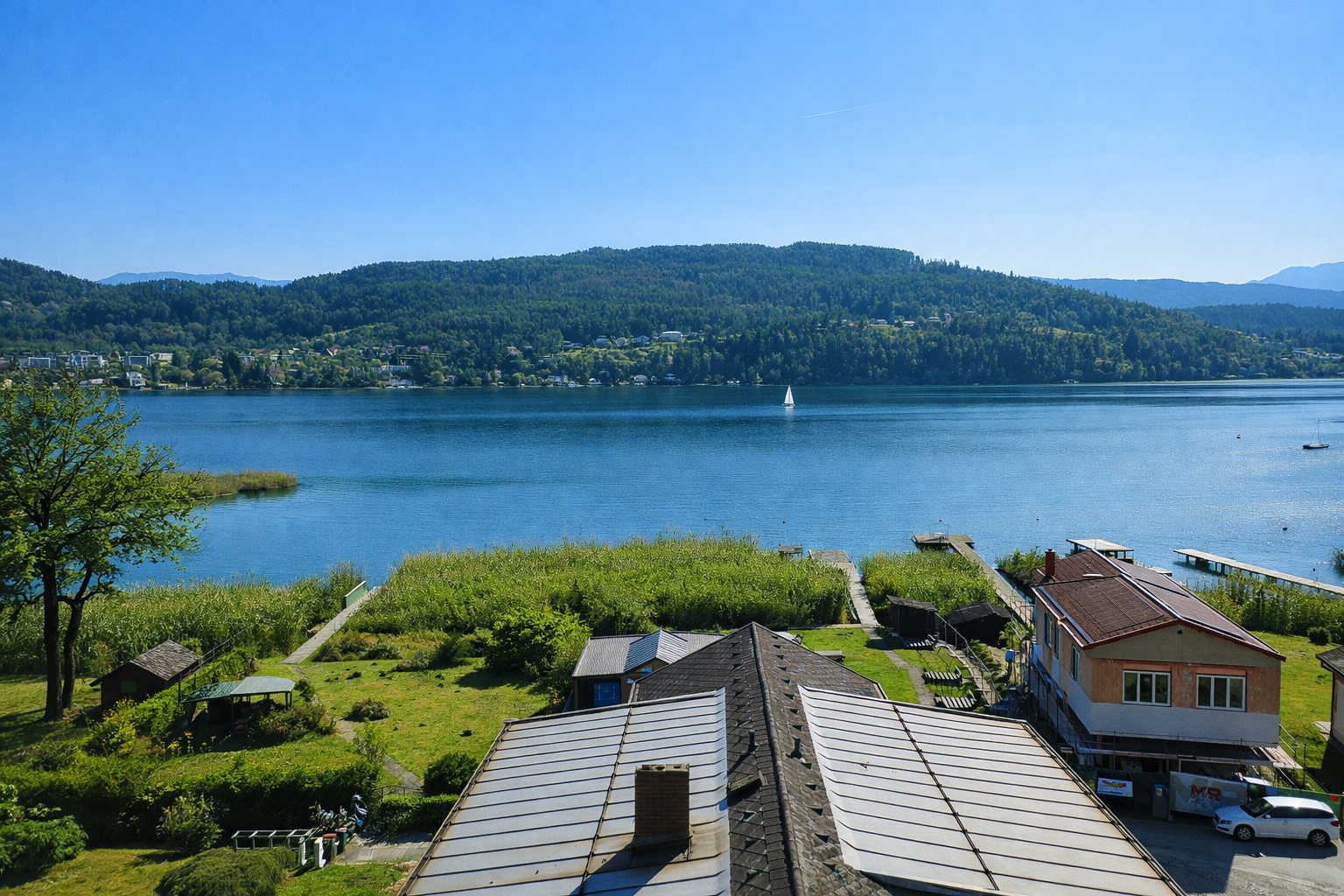 Sonniges Seegrundstück mit bestehendem Appartementhaus direkt am Wörthersee — Bild 3