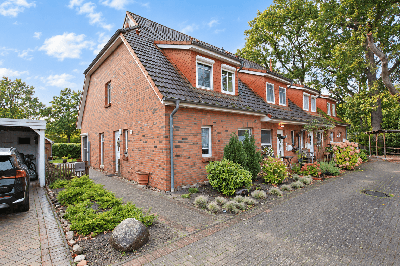 Vorderansicht – Gepflegtes Reihenendhaus mit 134 m² Wohnfläche, Garten und Carport in Bremen Borgfeld