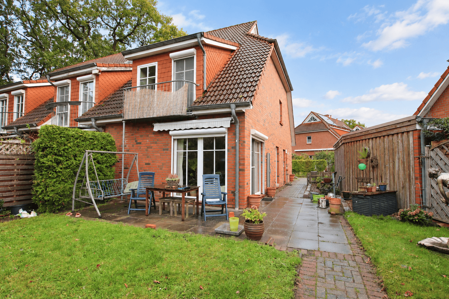 Hausansicht hinten – Gepflegtes Reihenendhaus mit 134 m² Wohnfläche, Garten und Carport in Bremen Borgfeld