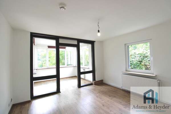 Wohnzimmer mit Wintergarten EG