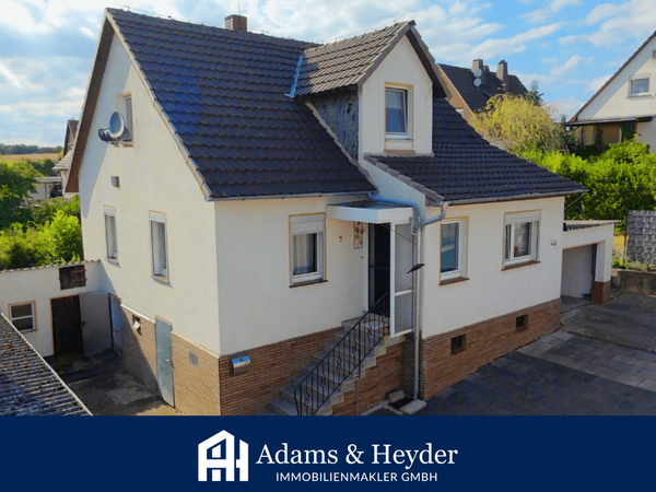Familienfreundliches Einfamilienhaus mit Garage, Garten und ausgebautem Dachgeschoss