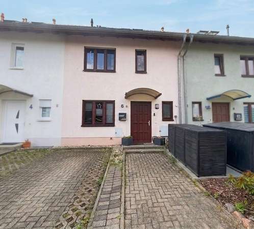 Familienfreundliches Reihenmittelhaus mit großzügigem Wohnkonzept, Garten und Stellplatz