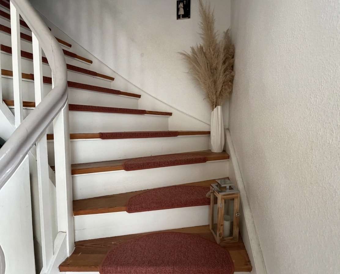 Treppe zum Obergeschoss