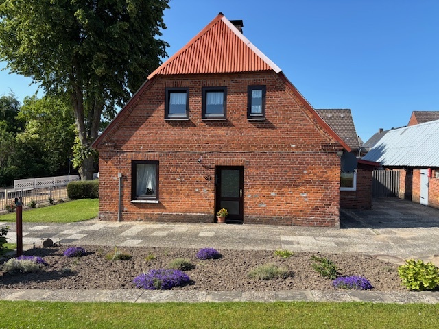 Preisbewusste Doppelhaushälfte mit viel Grün in 24239 Achterwehr. – Bild 4