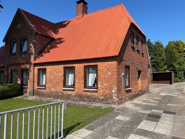 Preisbewusste Doppelhaushälfte mit viel Grün in 24239 Achterwehr. – Bild 2