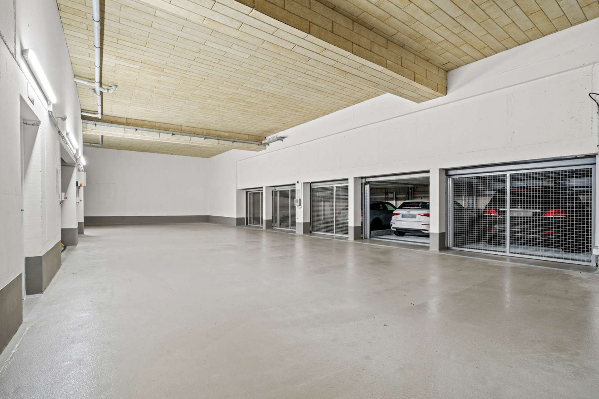 ERSTBEZUG MIT SEEBLICK: STILVOLLE NEUBAUWOHNUNG IN ÜBERLINGEN – VERKAUF - TG-Stellplatz