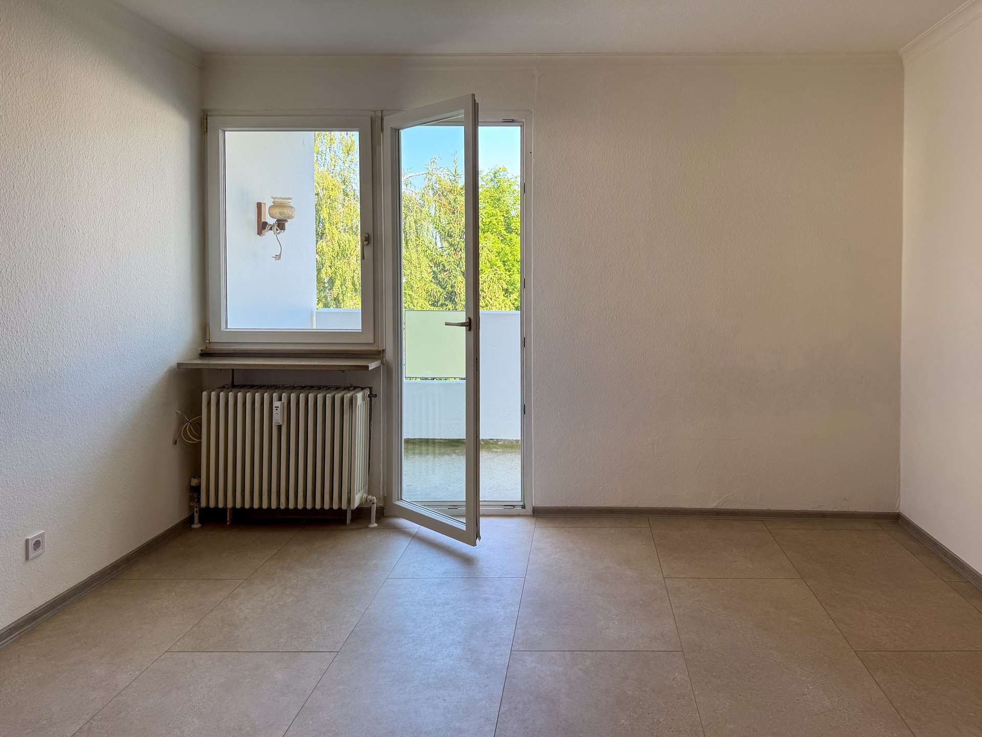 Schlafzimmer mit Balkon
