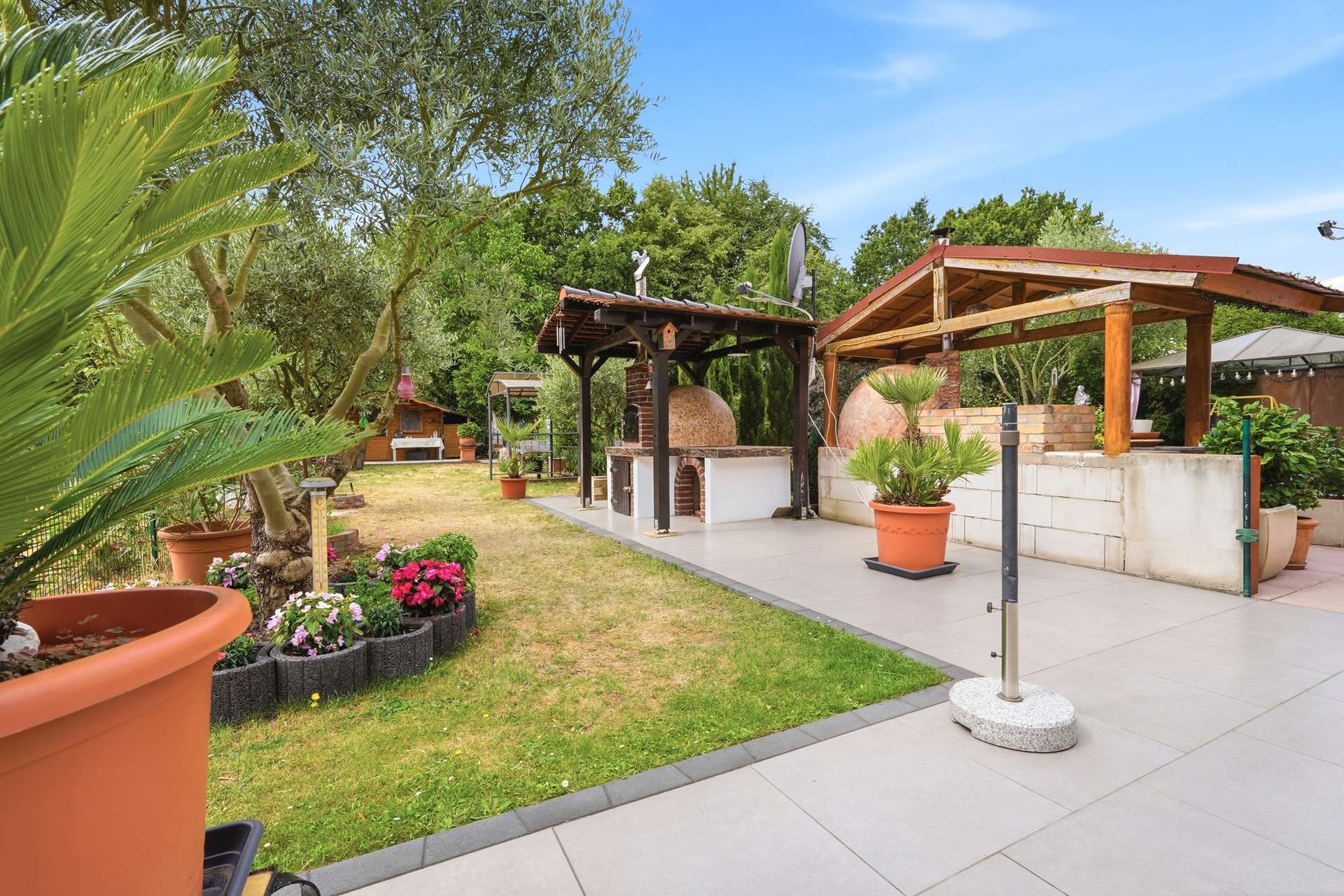 Gepflegtes Reihenhaus mit Südwestgarten in Seenähe – Bild 1