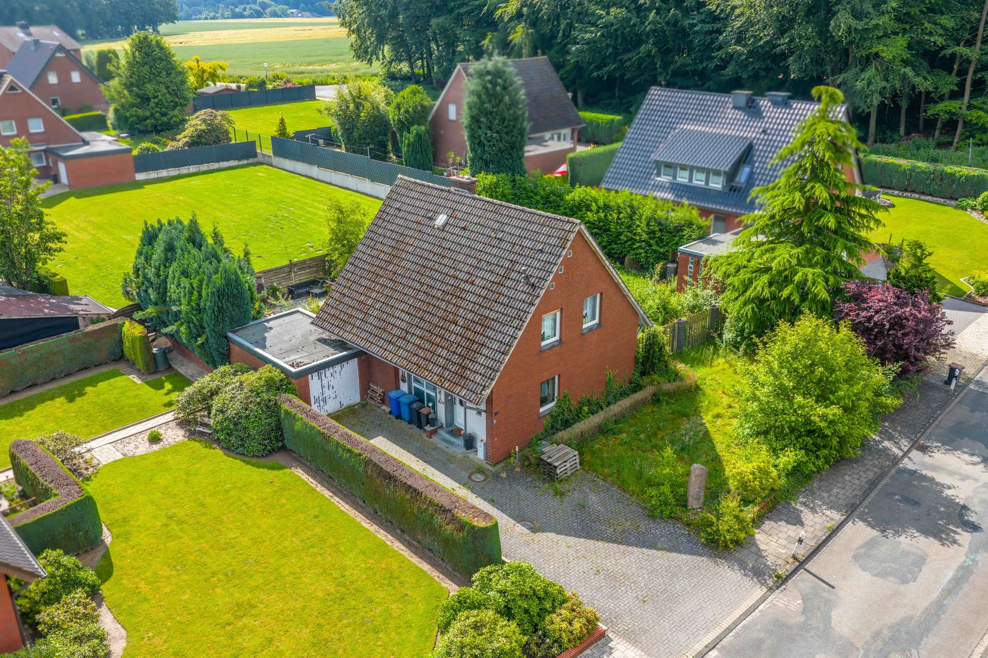 Einfamilienhaus mit großem Grundstück und viel Gestaltungspotenzial in Mettingen – Bild 1