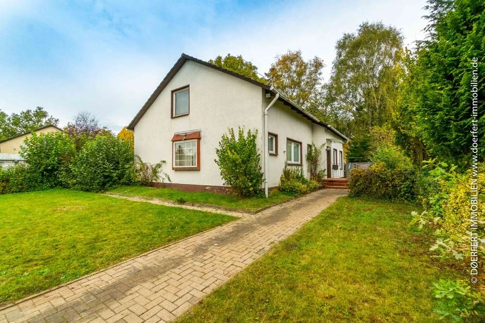 Rosengarten – Klecken | Sanierungsbedürftiges Einfamilienhaus in wunderschöner und ruhiger Wohnlage – Bild 1