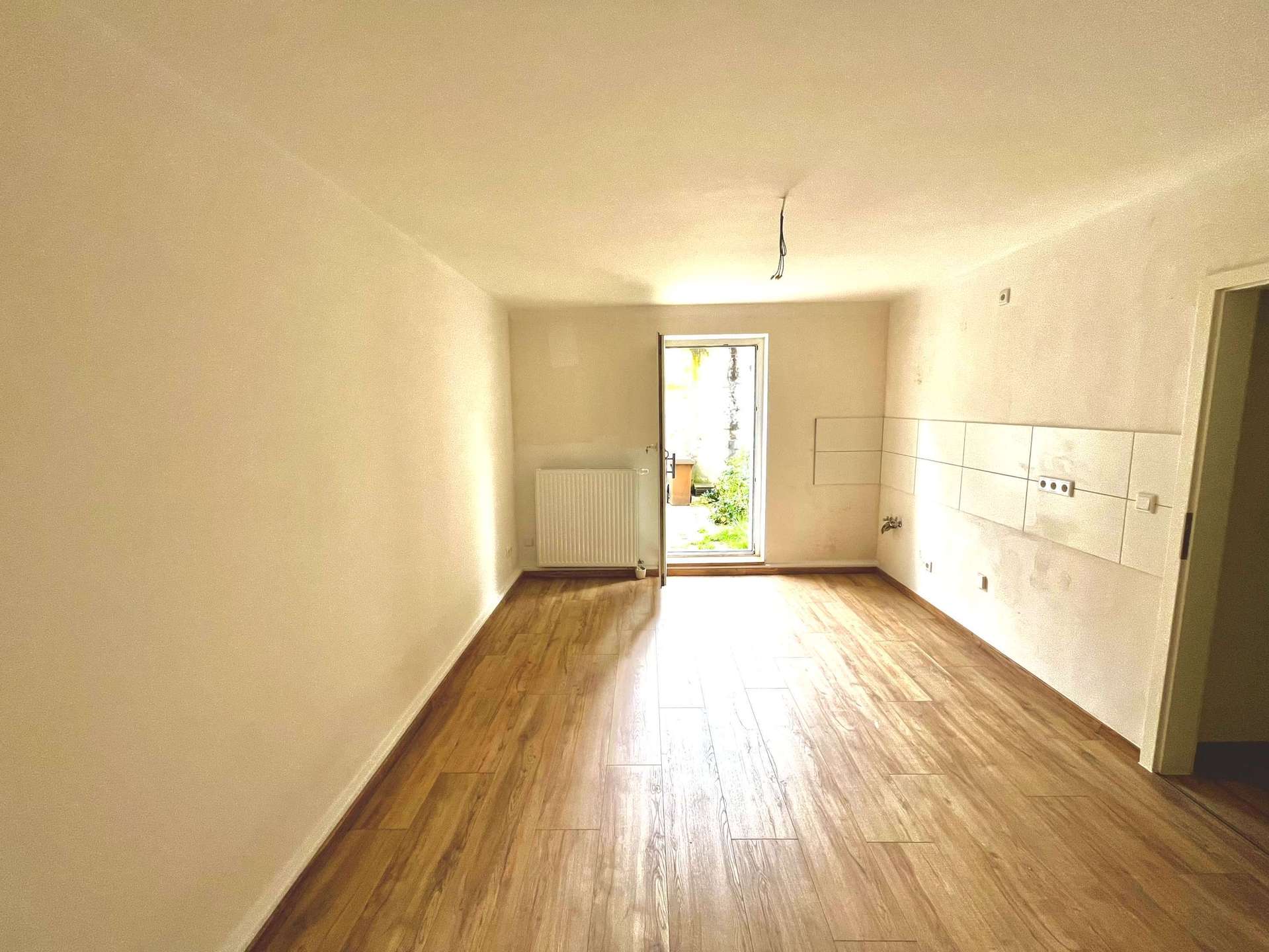 Schlau investieren: Mehrfamilienhaus mit 3 Wohneinheiten und Garten. In Mettmann. – Bild 4