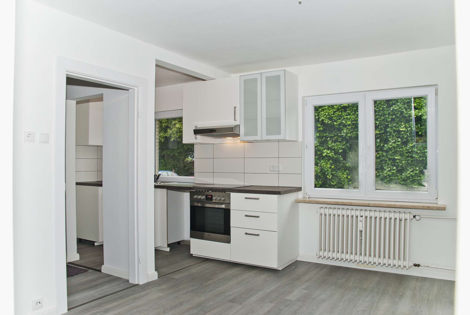 Vielseitiges Zweifamilienhaus mit drei Wohneinheiten und weitläufigem Garten – Schenefeld