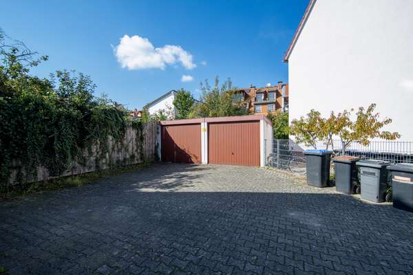 Urbanes Wohnen & ein hohes Maß an Lebensqualität: Charmantes Einfamilienhaus mit Einliegerwohnung — Bild 31 von 31