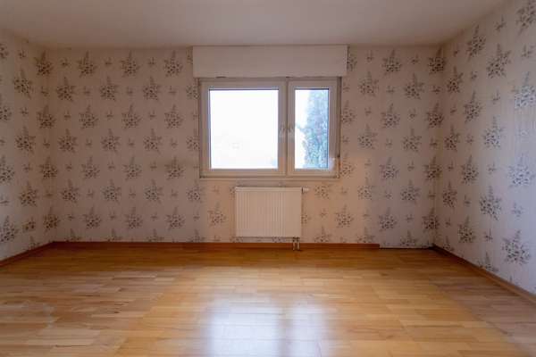 Solides Reihenmittelhaus mit großem Potenzial in Bischofsheim! — Bild 12 von 15