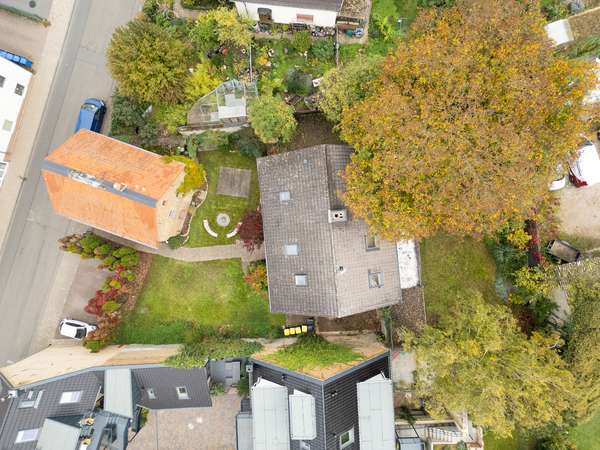 Zwei Häuser auf ca. 1.025 m² – Mehrfamilienhaus + Altbau mit Entwicklungs- und Renditepotenzial — Bild 2 von 42