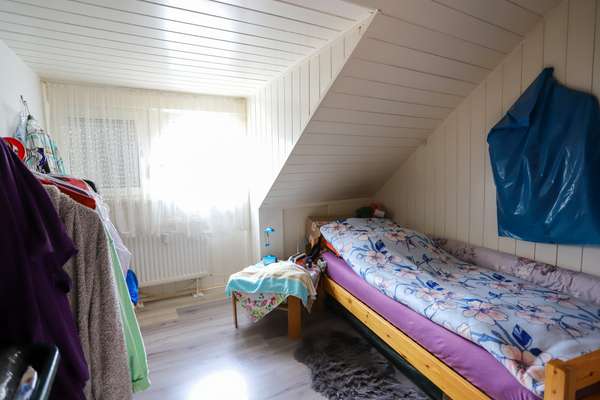 Investieren in Vielseitigkeit: Mehrfamilienhaus mit attraktiver Ladenfläche in Mainz-Kastel — Bild 23 von 24