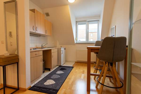 Charmante Dachgeschosswohnung in Wackernheim — Bild 2 von 7