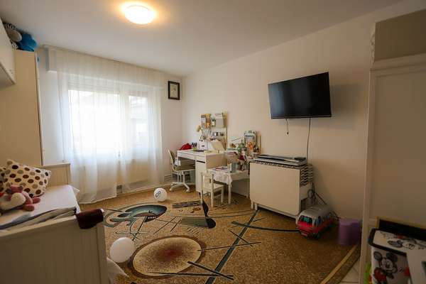 Investieren in Vielseitigkeit: Mehrfamilienhaus mit attraktiver Ladenfläche in Mainz-Kastel — Bild 11 von 24