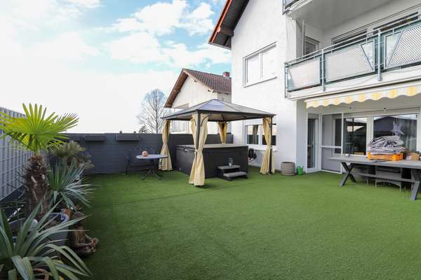 Gepflegtes Mehrfamilienhaus mit 3 Wohnungen im tollen Essenheim! — Bild 6 von 23