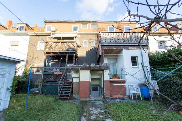 Mehrfamilienhaus mit 6 Wohneinheiten in zentraler Lage! — Bild 35 von 36