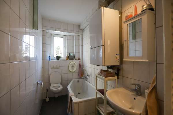 Investieren in Vielseitigkeit: Mehrfamilienhaus mit attraktiver Ladenfläche in Mainz-Kastel — Bild 13 von 24